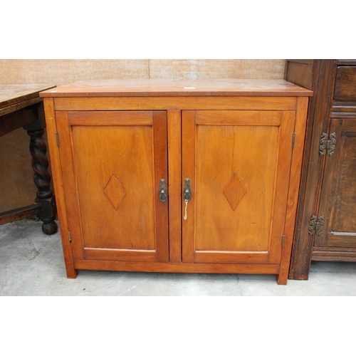 3152 - A TWO DOOR TEAK CABINET 36