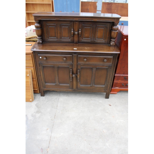 3157 - AN ERCOL BLUE LABEL COURT CUPBOARD - 48