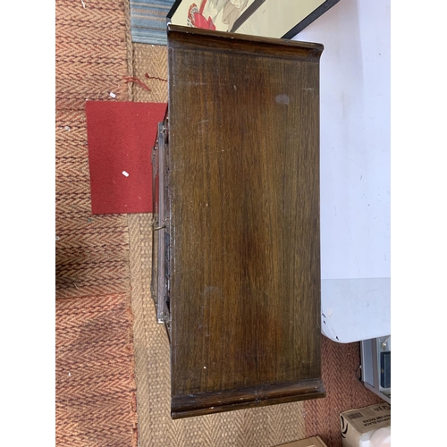 440 - A KOREAN WOOD AND BRASS APOTHECARY CABINET, REVEALING 14 DRAWERS, STACKED ON A HINGED DOOR COMPARTME... 