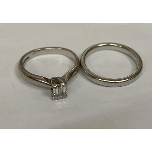 462 - A LADIES' SET OF TWO PLATINUM RINGS, ONE SET WITH AN APPROXIMATELY HALF CARAT DIAMOND AND ONE A BAND