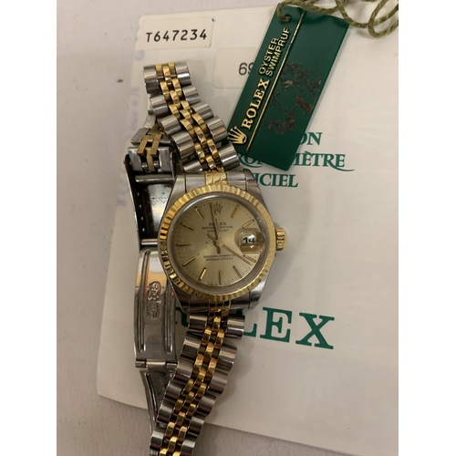 465 - A LADIES' BI-METAL ROLEX DATEJUST WRISTWATCH WITH TAGS AND CARD