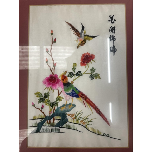 423 - AN ORIENTAL SILK HAND EMBROIDERED ART PIECE IN BAMBOO FRAME