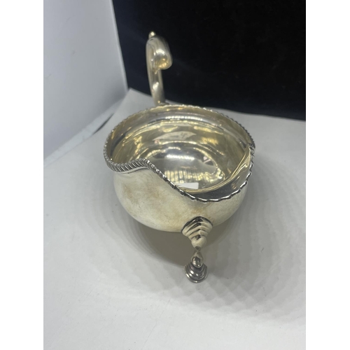 10 - A BOODLE AND DUNTHORNE HALLMARKED CHESTER SILVER SAUCE BOAT GROSS WEIGHT 146.8 GRAMS