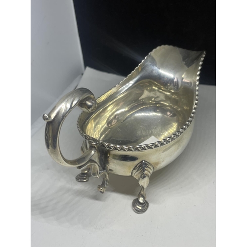 10 - A BOODLE AND DUNTHORNE HALLMARKED CHESTER SILVER SAUCE BOAT GROSS WEIGHT 146.8 GRAMS