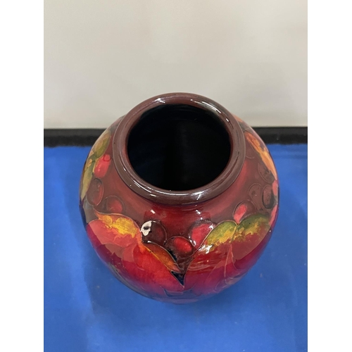 23 - A MOORCROFT FLAMBE LEAF AND BERRY DESIGN VASE