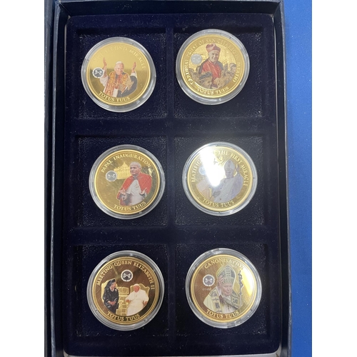 25 - A SET OF SIX LIMITED EDITION GOLD PLATED COINS DEPICTING POPE IN 2014 BY THE EU COMMISSION AND THE D... 