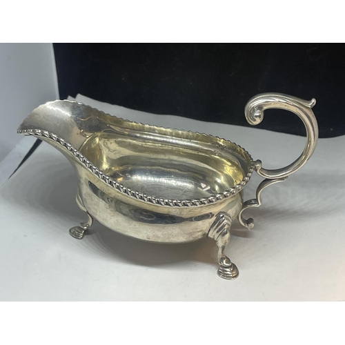 53 - A BOODLE AND DUNTHORNE HALLMARKED CHESTER SILVER SAUCE BOAT GROSS WEIGHT 145.1 GRAMS