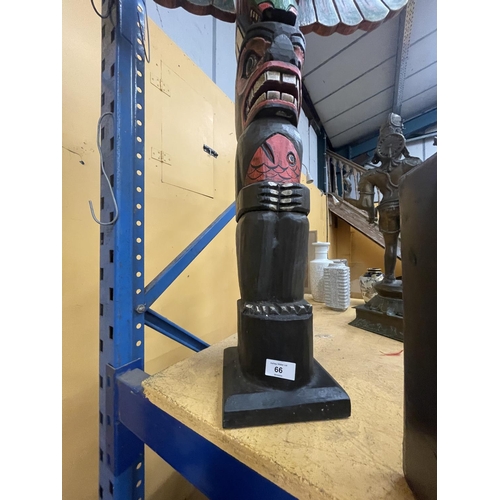 66 - A CARVED WOODEN TOTEM POLE