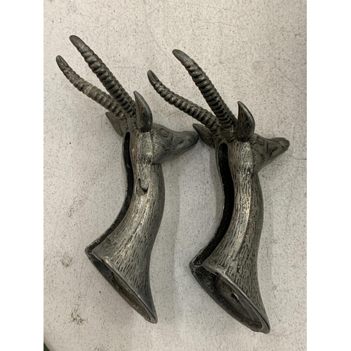 116 - A PAIR OF STAG HEAD COAT HOOKS