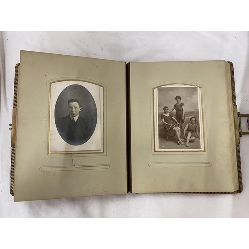 139 - A VICTORIAN LEATHERBOUND PHOTO ALBUM CONTAINING PHOTO'S