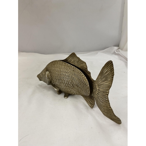 149 - A VINTAGE BRASS FISH SHAPED NAPKIN HOLDER