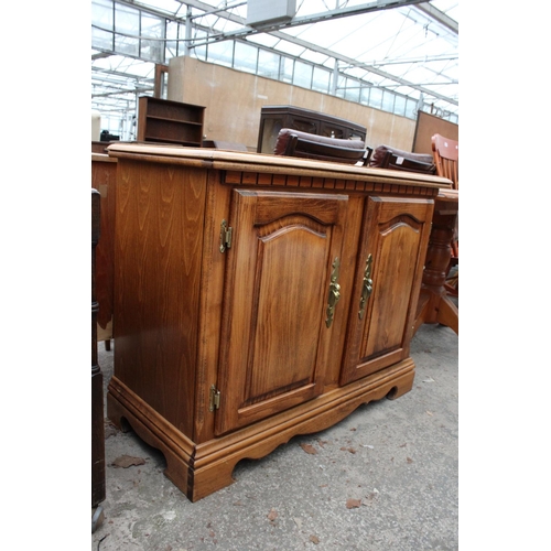 2881 - A MODERN BEECH SIDE-CABINET WITH TWO PANELLED DOORS, 39