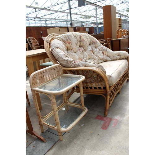 2917 - A MODERN BAMBOO SETTEE AND A SMALL GLASS TOP TABLE