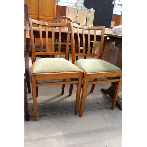 2925 - AN EDWARDIAN MAHOGANY AND INLAID CARVER CHAIR AND A PAIR OF BEECH KITCHEN CHAIRS