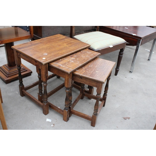 2945 - A NEST OF THREE TABLES AND A MAHOGANY DINING CHAIR