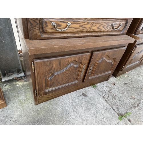 3063 - AN OAK CABINET WITH GLAZED AND LEADED UPPER PORTION, 37