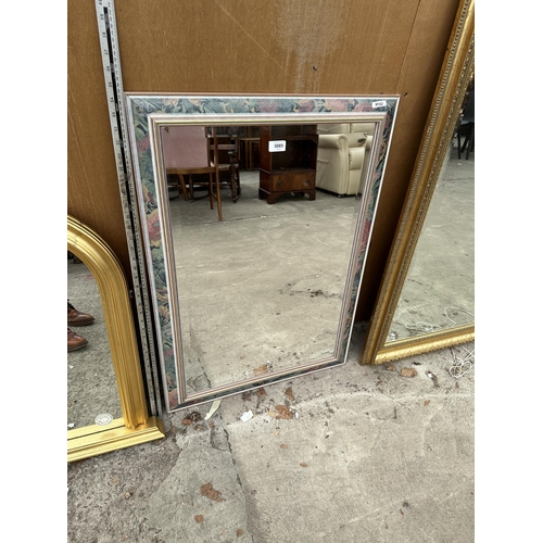 3085 - A RECTANGULAR FLORAL FRAMED MIRROR