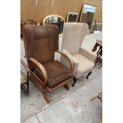 3110 - AN ART DECO STYLE ROCKING CHAIR AND WINGED FIRESIDE CHAIR ON CABRIOLE LEGS