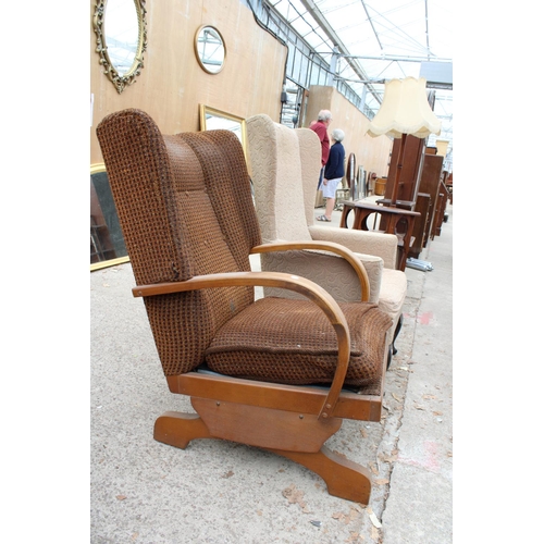 3110 - AN ART DECO STYLE ROCKING CHAIR AND WINGED FIRESIDE CHAIR ON CABRIOLE LEGS