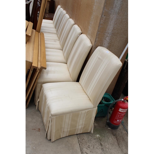 3147 - A SET OF EIGHT UPHOLSTERED SKIRT DINING CHAIRS