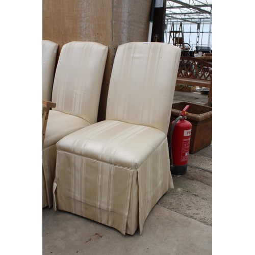 3147 - A SET OF EIGHT UPHOLSTERED SKIRT DINING CHAIRS