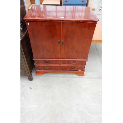 3156 - A YEW WOOD TV CABINET