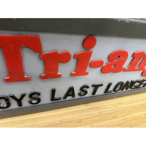 345A - AN ILLUMINATED TRI-ANG TOYS LAST LONGER SIGN (L:50CM H:21CM)