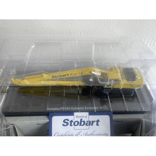 379 - FOUR BOXED STOBART MODELS OF EXCAVATORS SOME WITH COA