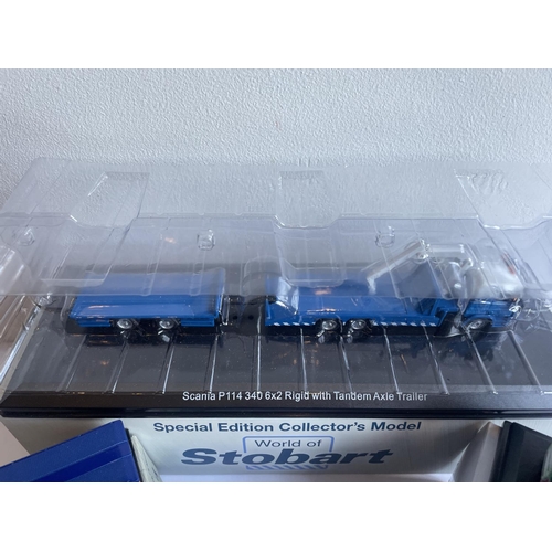 382 - THREE BOXED STOBART WAGONS (ONE WITH COA) AND FOUR CONTAINERS