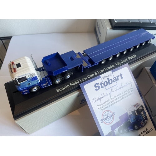 382 - THREE BOXED STOBART WAGONS (ONE WITH COA) AND FOUR CONTAINERS