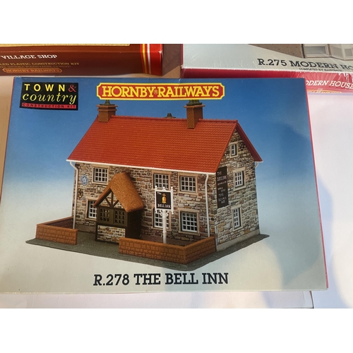 421 - FIVE AS NEW AND BOXED HORNBY 00 GAUGE RAILWAY MODEL BUILDINGS TO INCLUDE A BANK, VILLAGE SHOP, BELL ... 