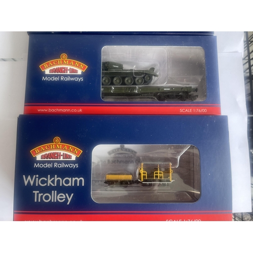 449 - FOUR BOXED BACHMANN 00 GAUGE FREIGHT CARRIAGES TO INCLUDE TWO WITH MILITARY TANKS