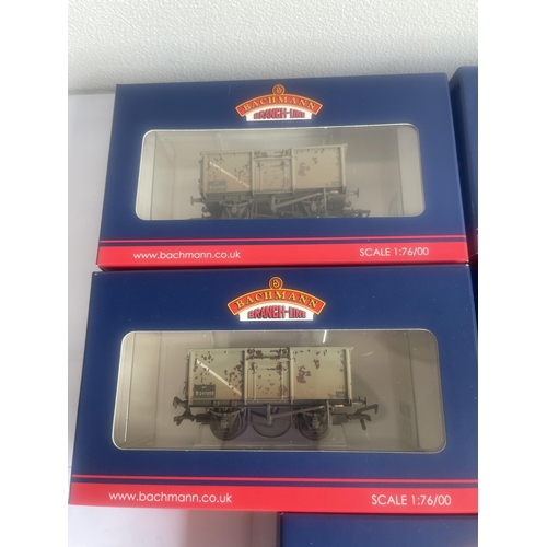 451 - FIVE BOXED BACHMANN 00 GAUGE FREIGHT CARRIAGES TO INCLUDE TWO WITH MILITARY TANKS