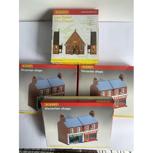 461 - FOUR BOXED HORNBY 00 GAUGE MODEL BUILDING KITS TO INCLUDE THREE VICTORIAN SHOPS AND A LOW RELIEF THE... 