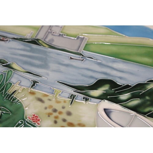 104 - TWO HAND PAINTED CERAMIC TILES TO INCLUDE KISIMUL CASTLE PLUS A INDOOR CAFE SCENE