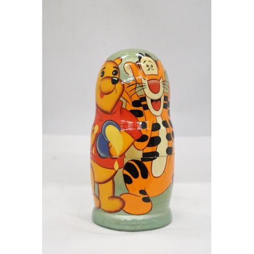 116 - A WINNE THE POOH AND PALS RUSSIAN DOLL - APPROXIMATELY 18CM HIGH