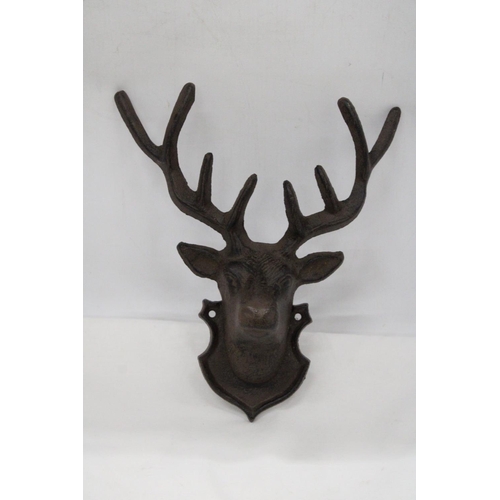 124 - A CAST IRON WALL HANGING STAG - 11 X 9 INCH