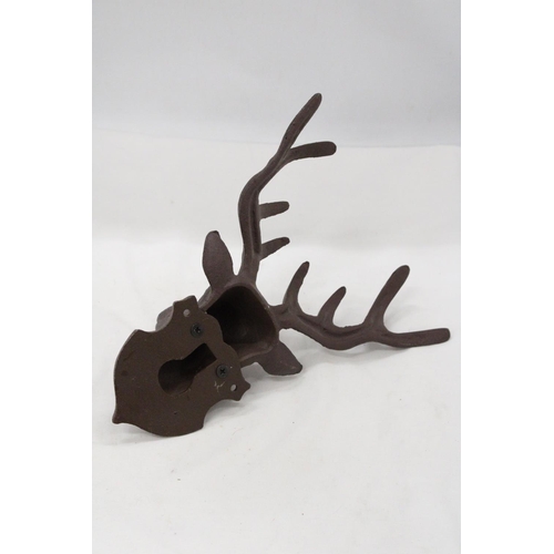 124 - A CAST IRON WALL HANGING STAG - 11 X 9 INCH