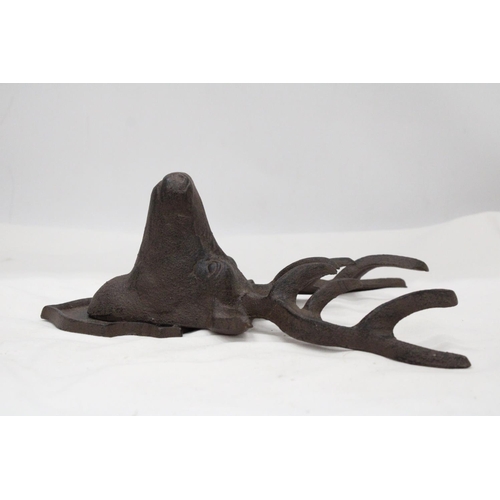 124 - A CAST IRON WALL HANGING STAG - 11 X 9 INCH