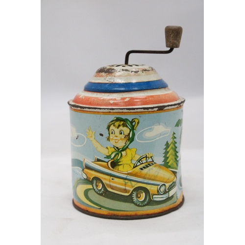 130 - A 1950'S GERMAN TIN PLATE MUSIC BOX IN WORKING ORDER AT TIME OF CATALOGUING