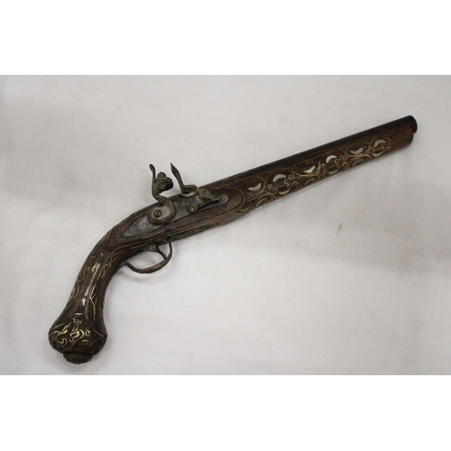 141 - A VINTAGE PISTOL WITH MOTHER OF PEARL AND BRASS INLAY