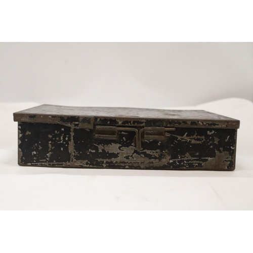 145 - A MILITARY ISSUE TIN BOX WITH CROW'S FOOT