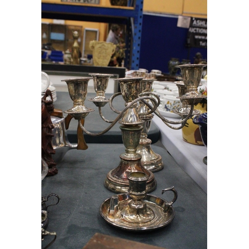 153 - A QUANTITY OF SILVER PLATE TO INCLUDE TWO CANDLEABRAS AND A'WEE WILLIE WINKIE' CANDLESTICK WITH SNUF... 