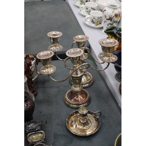 153 - A QUANTITY OF SILVER PLATE TO INCLUDE TWO CANDLEABRAS AND A'WEE WILLIE WINKIE' CANDLESTICK WITH SNUF... 