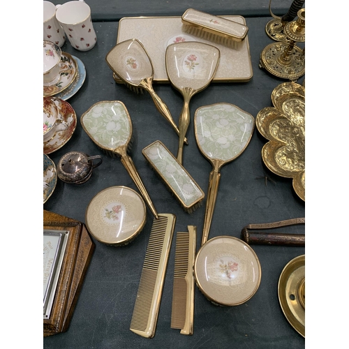 163 - A COLLECTION OF DRESSING TABLE BRUSHES WITH FLORAL DECORATION TO THE BACKS PLUS A TRAY, HAND MIRRORS... 