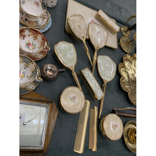 163 - A COLLECTION OF DRESSING TABLE BRUSHES WITH FLORAL DECORATION TO THE BACKS PLUS A TRAY, HAND MIRRORS... 