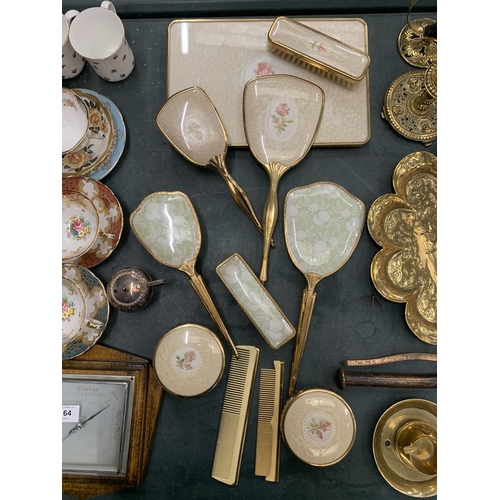 163 - A COLLECTION OF DRESSING TABLE BRUSHES WITH FLORAL DECORATION TO THE BACKS PLUS A TRAY, HAND MIRRORS... 