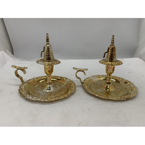 183 - A PAIR OF SILVER PLATED CANDLESTICKS AND SNUFFERS