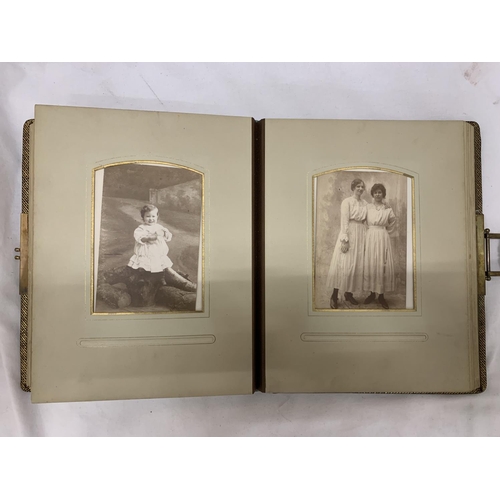 186 - A VICTORIAN LEATHERBOUND PHOTO ALBUM CONTAINING PHOTO'S