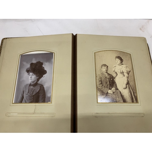 186 - A VICTORIAN LEATHERBOUND PHOTO ALBUM CONTAINING PHOTO'S